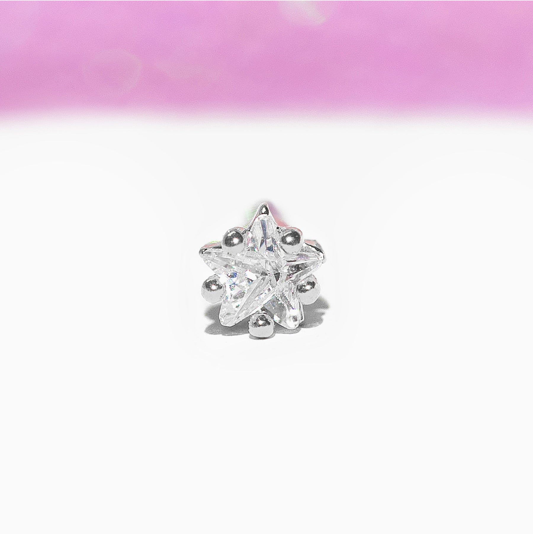 Teeniest & Brightest Star Piercing Style Earring