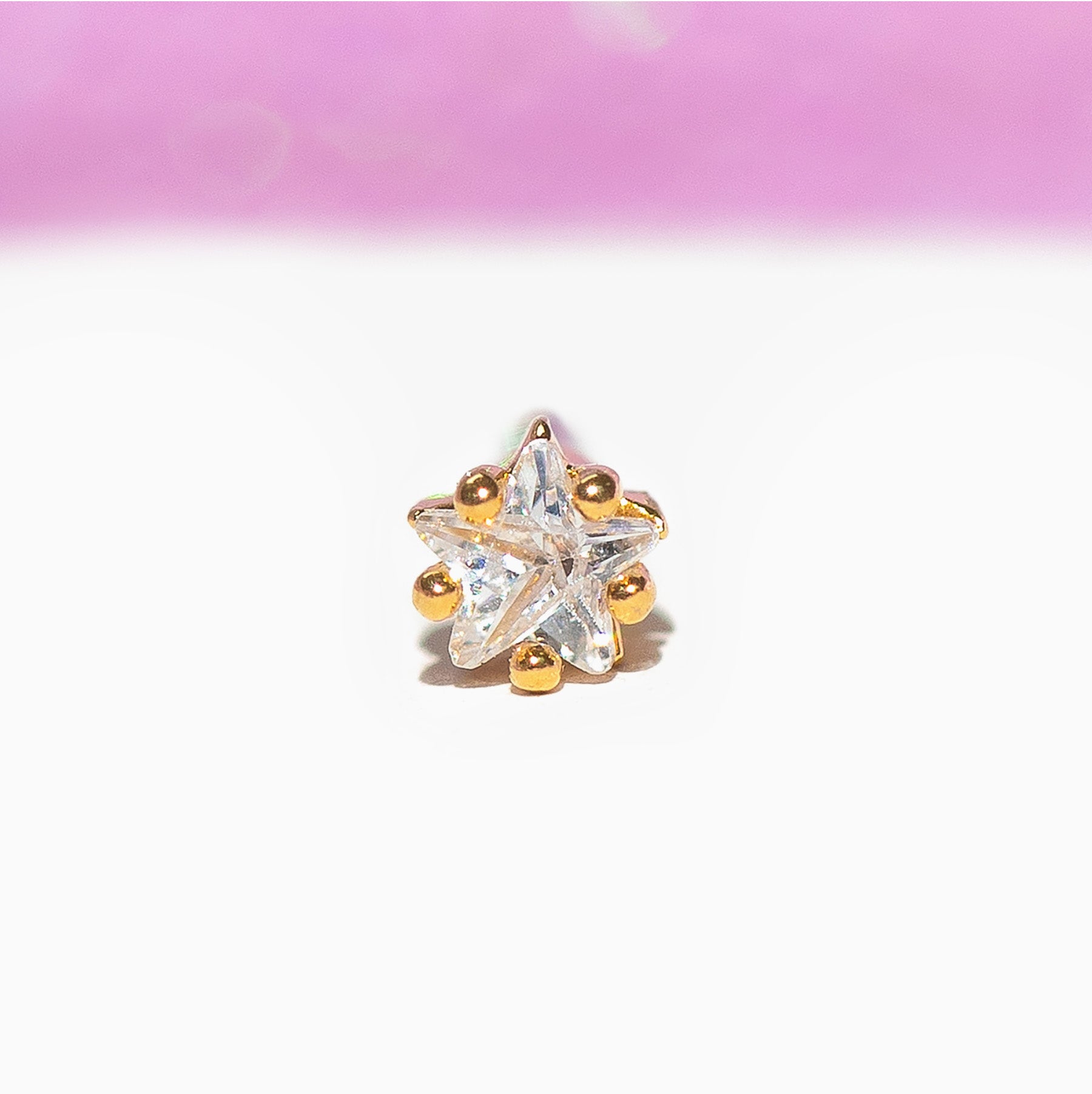 Teeniest & Brightest Star Piercing Style Earring