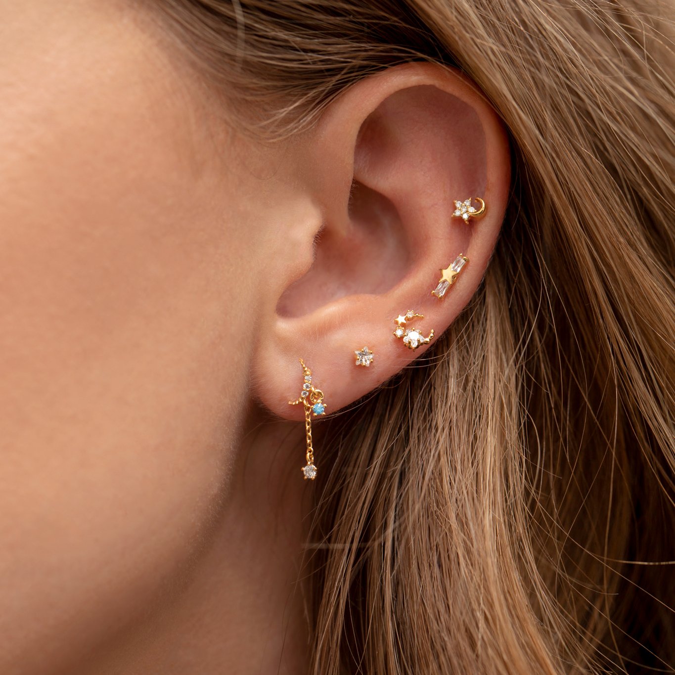 Teeniest & Brightest Star Piercing Style Earring