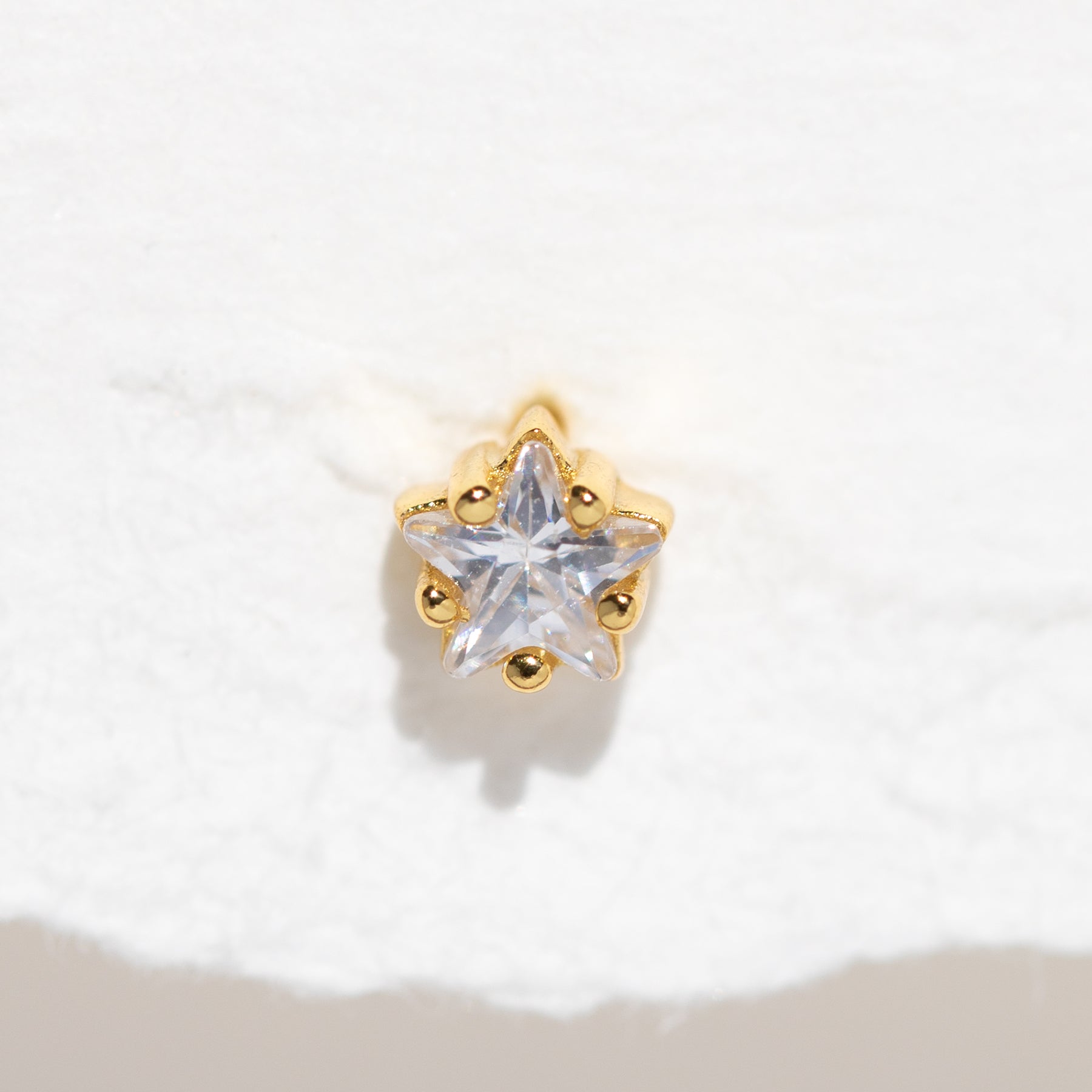 Teeniest & Brightest Star Piercing Style Earring