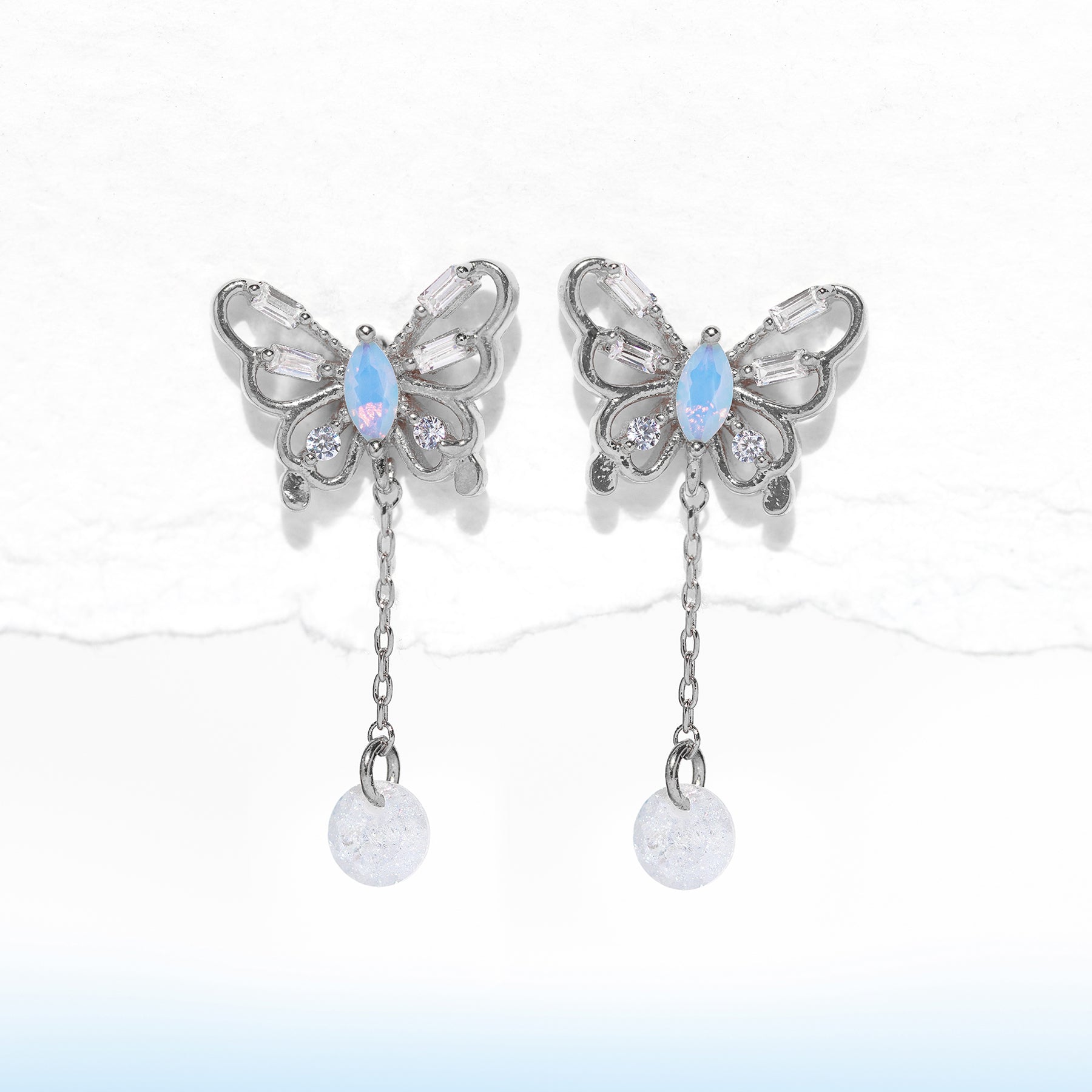 Pierced selling silver cutout dangle butterfly earrings